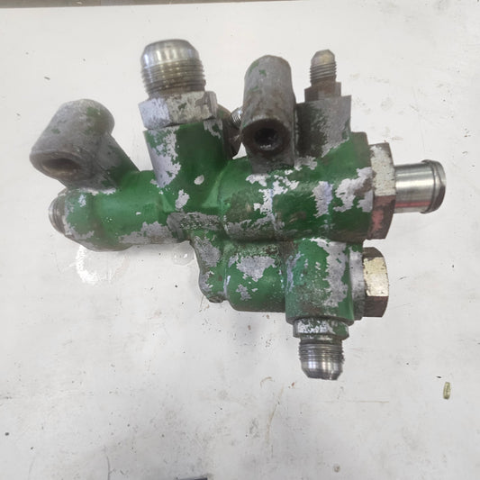 Return Oil Manifold R70506 - USED